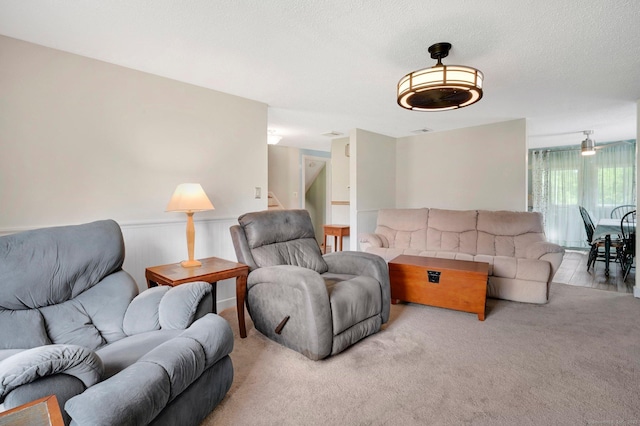 133 Savage Hill Rd, Berlin, CT 06037 - living area featuring stairs, a wainscoted wall, and carpet flooring