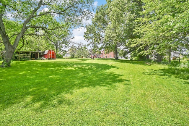 133 Savage Hill Rd, Berlin, CT 06037 - view of grassy yard with a barn and an outdoor structure