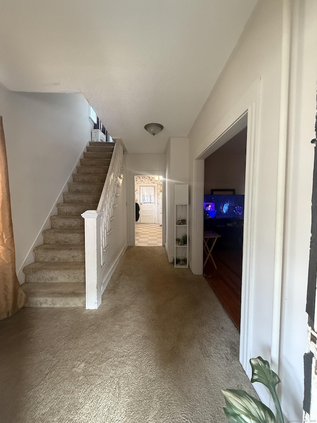 384 Park St, Bristol, CT 06010 - hall with stairway and carpet flooring