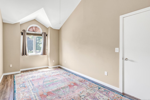 15 Perry Ave Unit D1, Norwalk, CT 06850 - empty room featuring lofted ceiling and wood finished floors