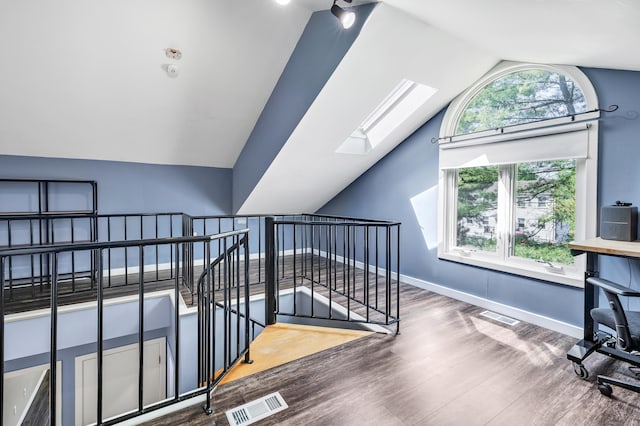 15 Perry Ave Unit D1, Norwalk, CT 06850 - stairway with lofted ceiling, a skylight, and wood finished floors