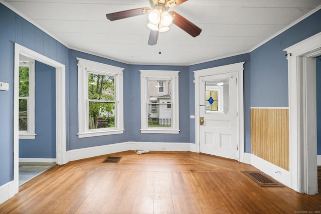 692 Enfield St, Enfield, CT 06082 - foyer featuring crown molding, wood-type flooring, and ceiling fan