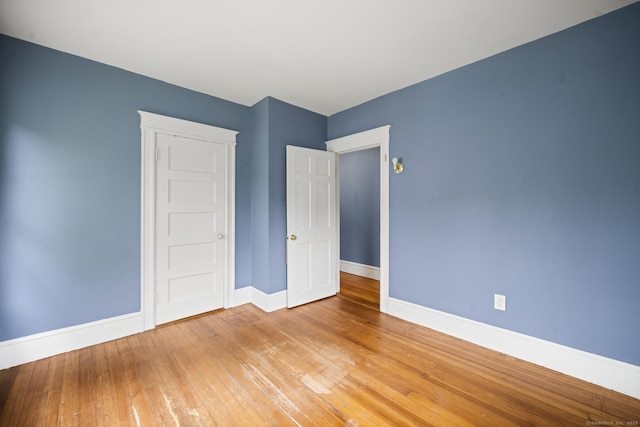 692 Enfield St, Enfield, CT 06082 - empty room featuring baseboards and light wood finished floors