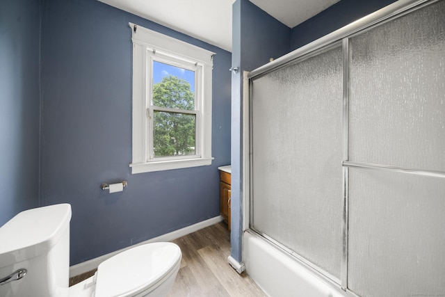 692 Enfield St, Enfield, CT 06082 - bathroom with a shower with shower door, wood finished floors, and vanity