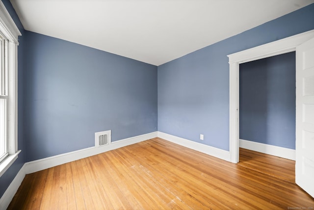 692 Enfield St, Enfield, CT 06082 - empty room featuring hardwood / wood-style flooring and baseboards