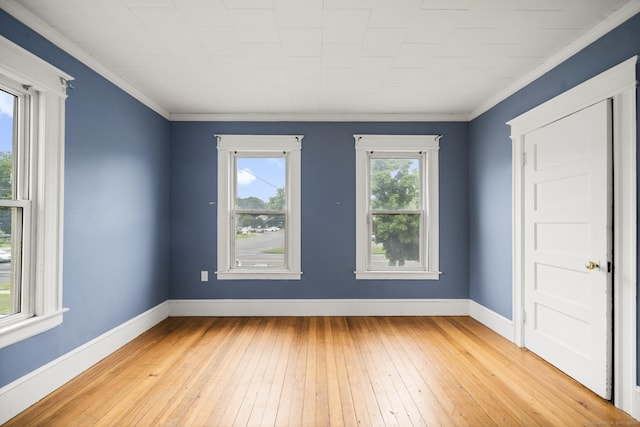 692 Enfield St, Enfield, CT 06082 - empty room featuring light wood-style flooring and ornamental molding