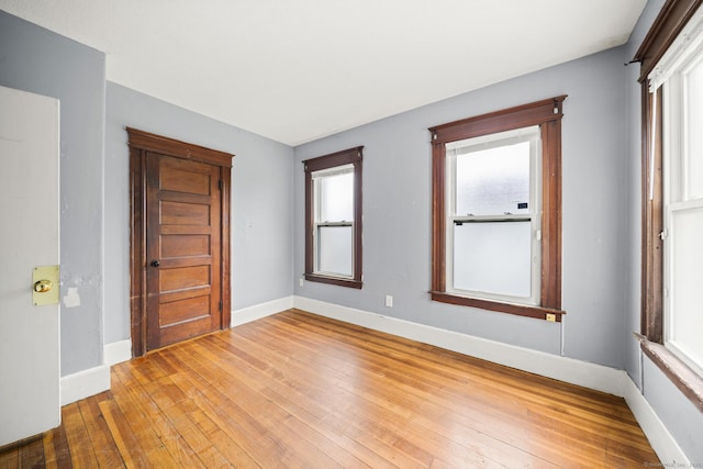 692 Enfield St, Enfield, CT 06082 - empty room featuring wood-type flooring and plenty of natural light