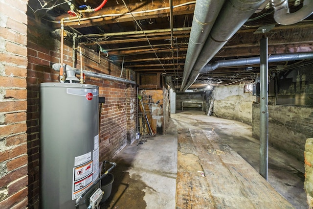 692 Enfield St, Enfield, CT 06082 - unfinished basement featuring gas water heater
