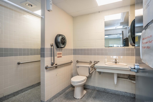 262 Shetucket Tpke Unit 2, Griswold, CT 06351 - bathroom with tile walls and wainscoting