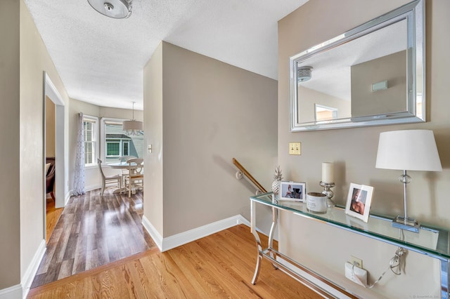 80 Quarry Village Rd, Cheshire, CT 06410 - hall featuring wood finished floors and a textured ceiling