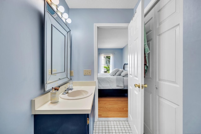 80 Quarry Village Rd, Cheshire, CT 06410 - ensuite bathroom with vanity and tile patterned floors