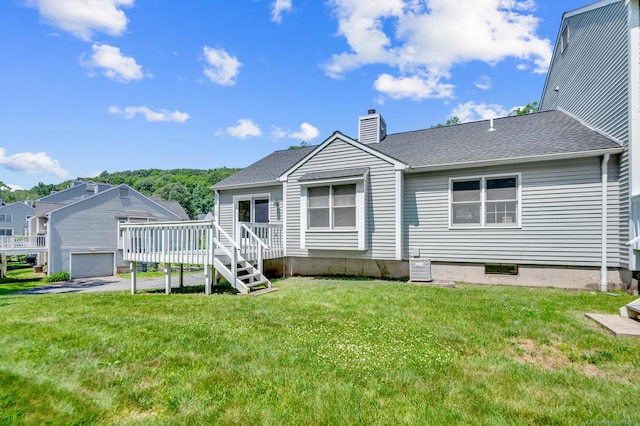 80 Quarry Village Rd, Cheshire, CT 06410 - back of house with a wooden deck, a chimney, a lawn, and a shingled roof