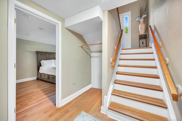 80 Quarry Village Rd, Cheshire, CT 06410 - stairway with wood finished floors and baseboards