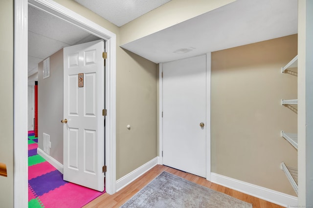 80 Quarry Village Rd, Cheshire, CT 06410 - basement with wood finished floors and baseboards