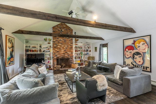 living area with wood finished floors, a ceiling fan, and a brick fireplace