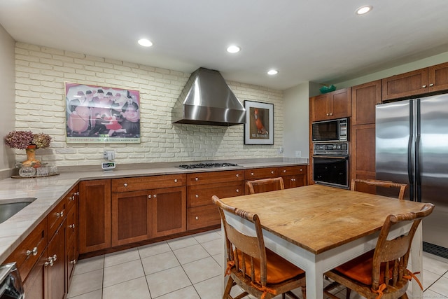 kitchen featuring black appliances, wall chimney exhaust hood, light tile patterned flooring, backsplash, and recessed lighting