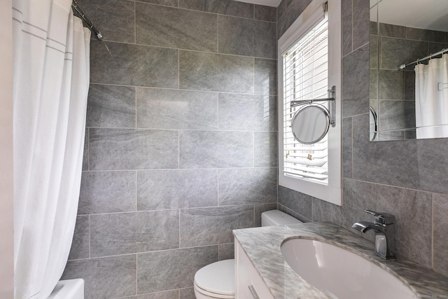 173 Bch Hill Rd E, Bridgewater, CT 06752 - full bathroom featuring tile walls, vanity, and shower / bath combo