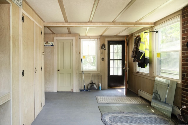 182 Church St, North Canaan, CT 06018 - foyer entrance featuring a baseboard radiator and healthy amount of natural light