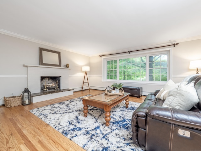 1 Blue Ridge Ln, Wilton, CT 06897 - living room featuring ornamental molding, a brick fireplace, wood finished floors, and a baseboard radiator