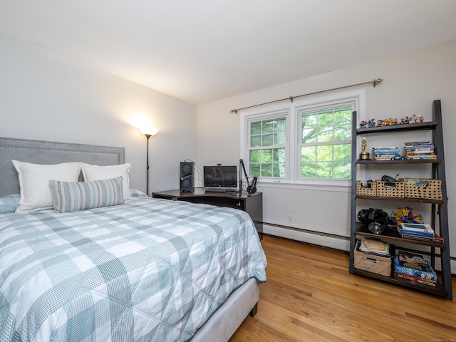 1 Blue Ridge Ln, Wilton, CT 06897 - bedroom with a baseboard radiator and light wood-type flooring