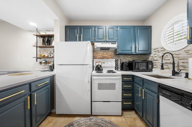 2122 Old Pond Ln Unit 2122, Norwich, CT 06360 - kitchen with white appliances, under cabinet range hood, blue cabinets, and decorative backsplash