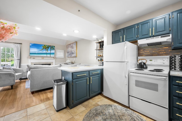 2122 Old Pond Ln Unit 2122, Norwich, CT 06360 - kitchen featuring under cabinet range hood, white appliances, a peninsula, light countertops, and recessed lighting