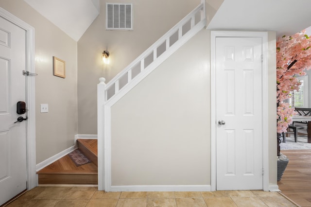 2122 Old Pond Ln Unit 2122, Norwich, CT 06360 - stairs with baseboards and lofted ceiling