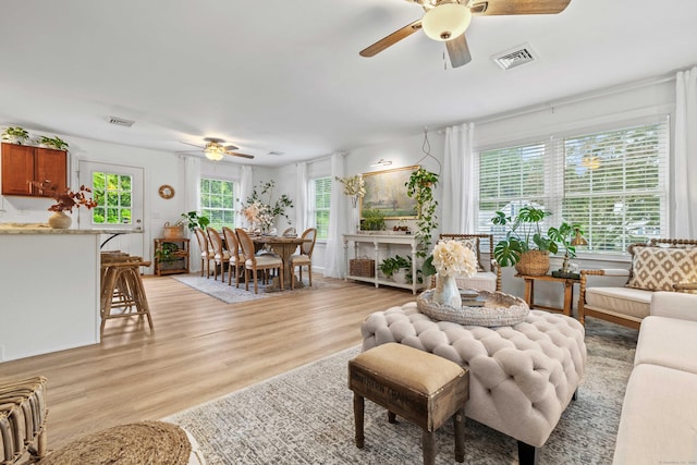 560 Laurel Hill Rd, Norwich, CT 06360 - living area featuring a ceiling fan and light wood finished floors