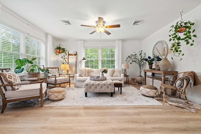 560 Laurel Hill Rd, Norwich, CT 06360 - living area with wood finished floors and a ceiling fan