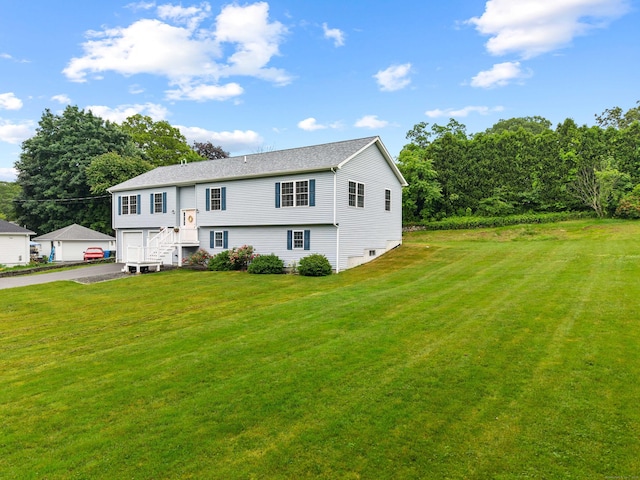 560 Laurel Hill Rd, Norwich, CT 06360 - raised ranch with asphalt driveway and a front lawn