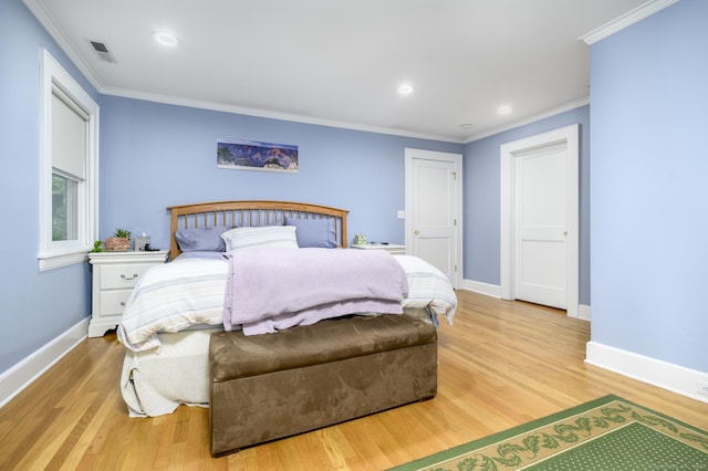 116 Knapp St, Stamford, CT 06907 - bedroom with wood finished floors, crown molding, and recessed lighting