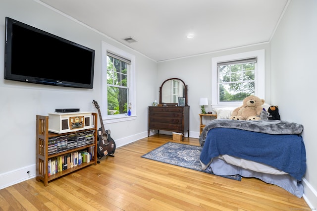 116 Knapp St, Stamford, CT 06907 - bedroom featuring light wood finished floors, crown molding, and multiple windows