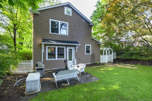 116 Knapp St, Stamford, CT 06907 - back of house featuring entry steps and a patio area