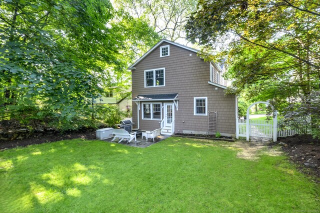 116 Knapp St, Stamford, CT 06907 - back of property featuring entry steps and a patio area