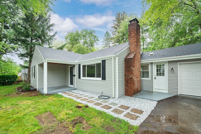 690 Bloomfield Ave, Windsor, CT 06095 - ranch-style home with a chimney, a front yard, and roof with shingles