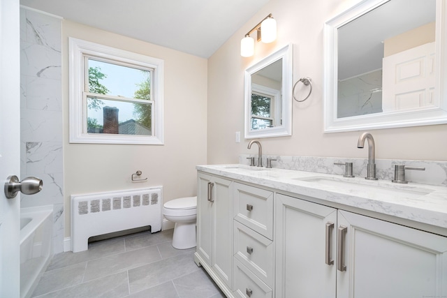 690 Bloomfield Ave, Windsor, CT 06095 - full bathroom with radiator heating unit, double vanity, tile patterned flooring, and shower / washtub combination