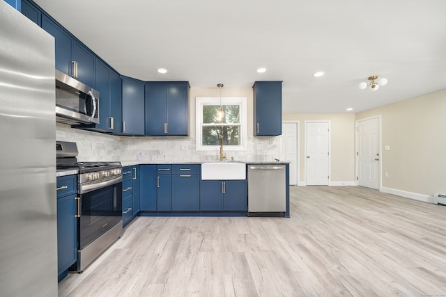 690 Bloomfield Ave, Windsor, CT 06095 - kitchen featuring stainless steel appliances, blue cabinets, light wood-style floors, tasteful backsplash, and recessed lighting