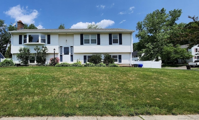 35 Montano Rd, Enfield, CT 06082 - split foyer home featuring a chimney