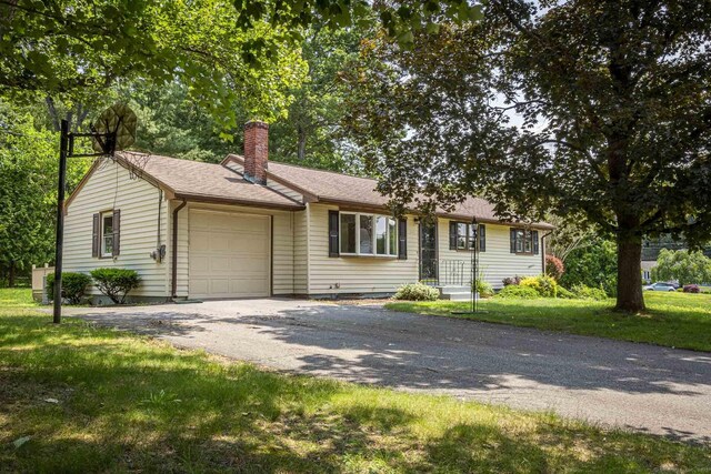 20 Sharon Dr, South Windsor, CT 06074 - ranch-style home with an attached garage, a chimney, asphalt driveway, and a front lawn