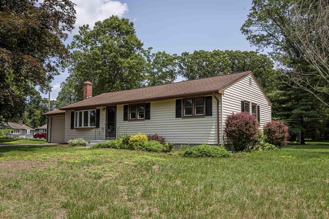 20 Sharon Dr, South Windsor, CT 06074 - single story home featuring an attached garage, a chimney, and a front lawn