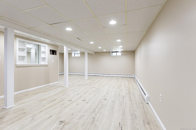 20 Sharon Dr, South Windsor, CT 06074 - basement featuring a baseboard radiator, wood finished floors, recessed lighting, and a baseboard heating unit