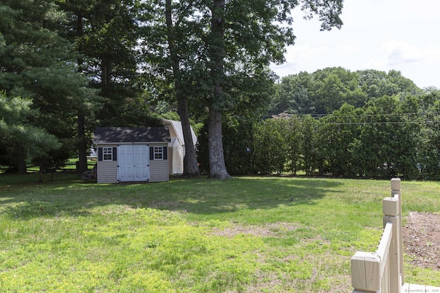 20 Sharon Dr, South Windsor, CT 06074 - view of green lawn featuring a shed