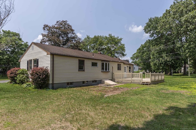 20 Sharon Dr, South Windsor, CT 06074 - rear view of house with a deck and a yard