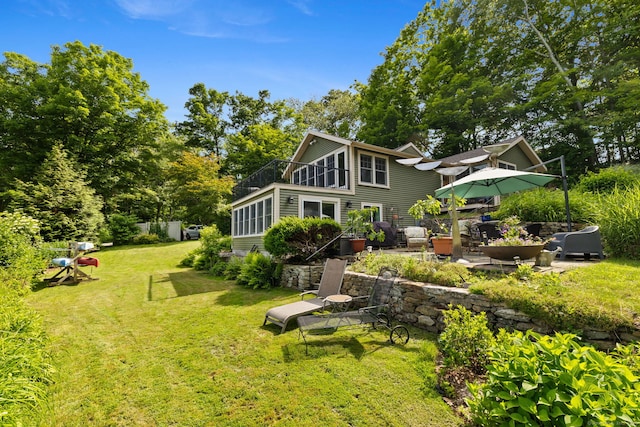 271 Haywardville Rd, East Haddam, CT 06415 - rear view of house featuring a yard, a patio area, and a balcony