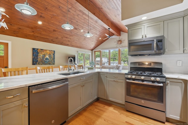 271 Haywardville Rd, East Haddam, CT 06415 - kitchen with appliances with stainless steel finishes, gray cabinetry, decorative backsplash, light stone counters, and light wood finished floors