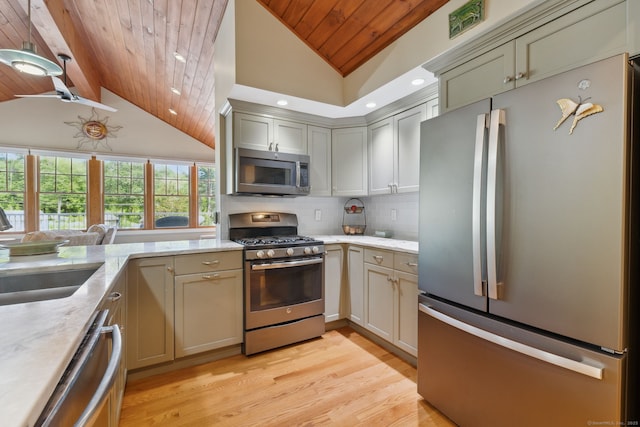 271 Haywardville Rd, East Haddam, CT 06415 - kitchen featuring appliances with stainless steel finishes, wood ceiling, light wood-type flooring, tasteful backsplash, and light stone counters