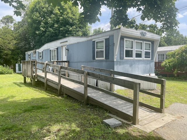 252 Old Canterbury Tpke Lot 40, Norwich, CT 06360 - view of front of property featuring a deck and a front yard