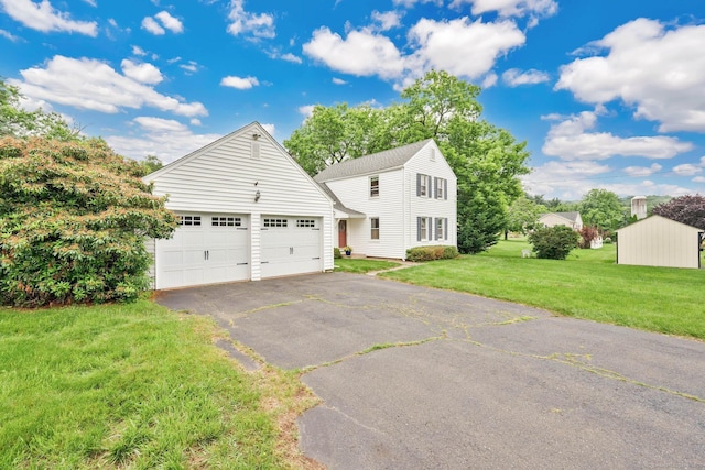 253 Gardner St, Manchester, CT 06040 - view of front of property featuring an outdoor structure, driveway, and a front yard