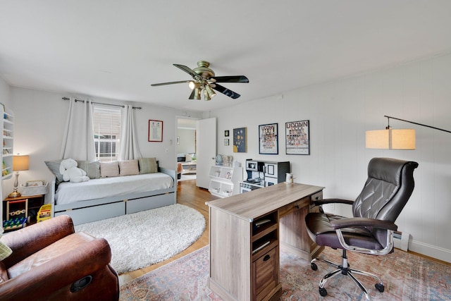 253 Gardner St, Manchester, CT 06040 - bedroom with an office area, wood finished floors, baseboard heating, and a ceiling fan
