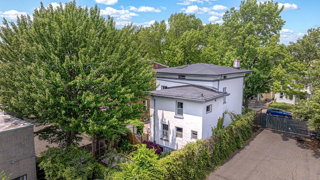 272 Saint John St, New Haven, CT 06511 - view of property exterior featuring stucco siding and a gate